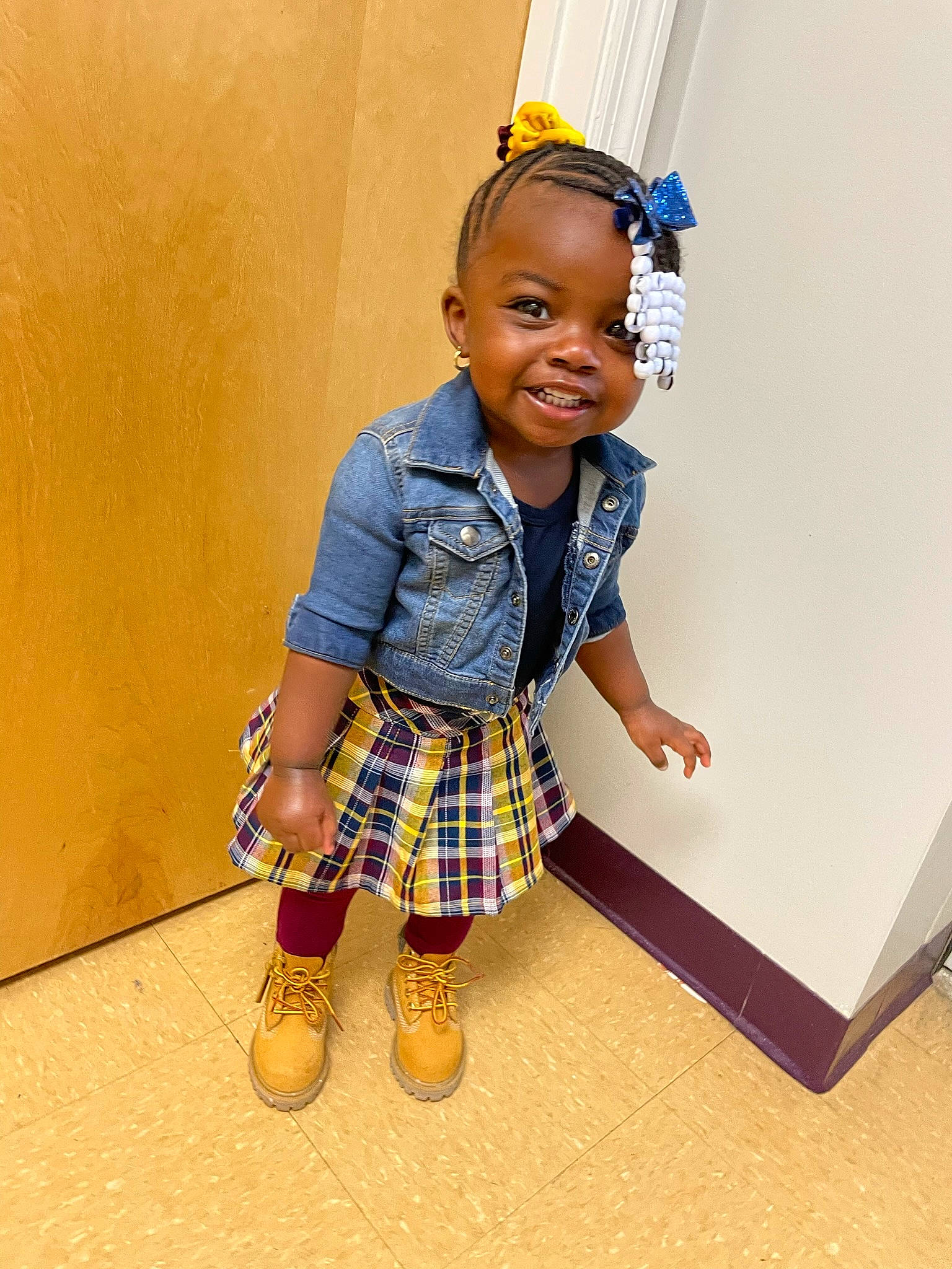 Jay'Leigh is registered to the contest to win money with this photo: arm, baby_toddler_clothing, collar, denim, electric_blue, fashion_design, happy, joy, neck, outerwear, pattern, person, plaid, shoulder, sleeve, smile, sock, sunglasses, t_shirt, tartan