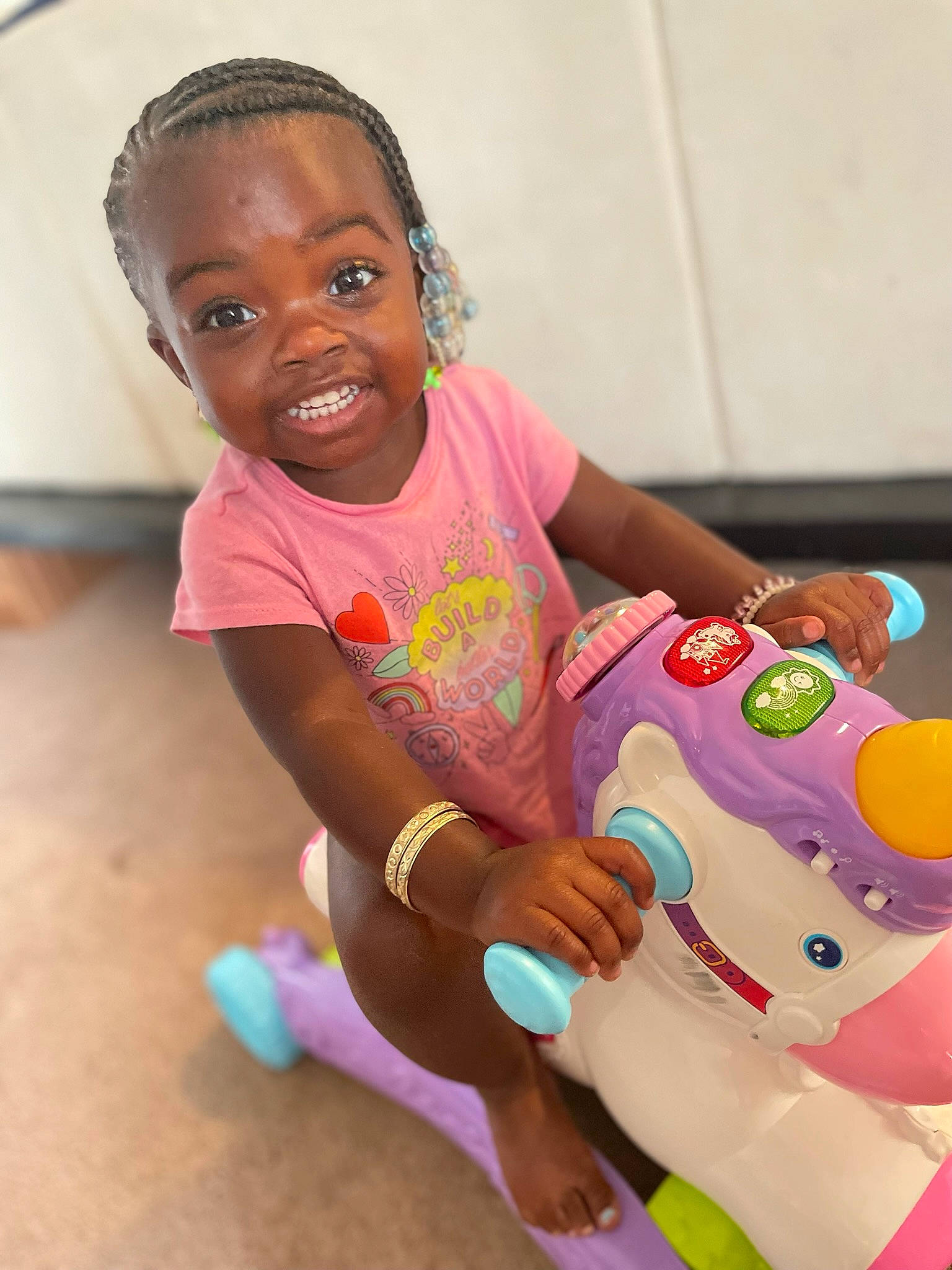 Jay'Leigh joined the competition — help win amazing prizes! baby, baby_toddler_clothing, cheek, child, face, fun, hairstyle, happy, head, joy, leisure, magenta, person, pink, shorts, sitting, skin, smile, stuffed_toy, t_shirt