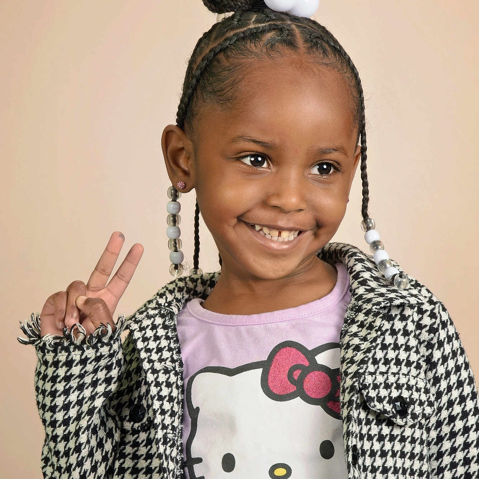 Heavenly joined the competition — help win amazing prizes! accessories, background, beads, braids, child, clothing, cute, earrings, fashion, girl, happy, hello_kitty_shirt, houndstooth_jacket, peace_sign, person, portrait, pose, smile, studio_light, young