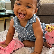Brooklyne joined the competition — help win amazing prizes! baby, smiling, red_bows, blue_dress, crawling, blanket, living_room, plush_toy, happy, child, indoor, furniture, natural_light, cute, infant, person, home, cozy, portrait, toddler