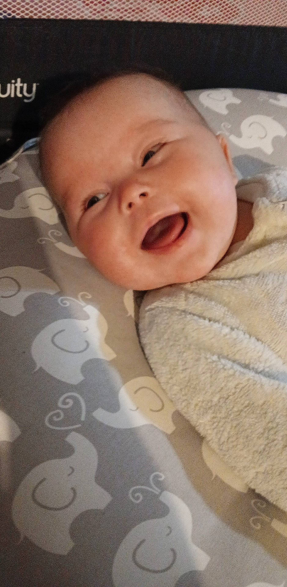 Mikenna is registered to the contest to win money with this photo: baby, bed, blanket, crib, cushion, face, furniture, happy, head, homedecor, infantbed, laughing, newborn, person, photography, portrait, quilt, sleeping, smile, towel