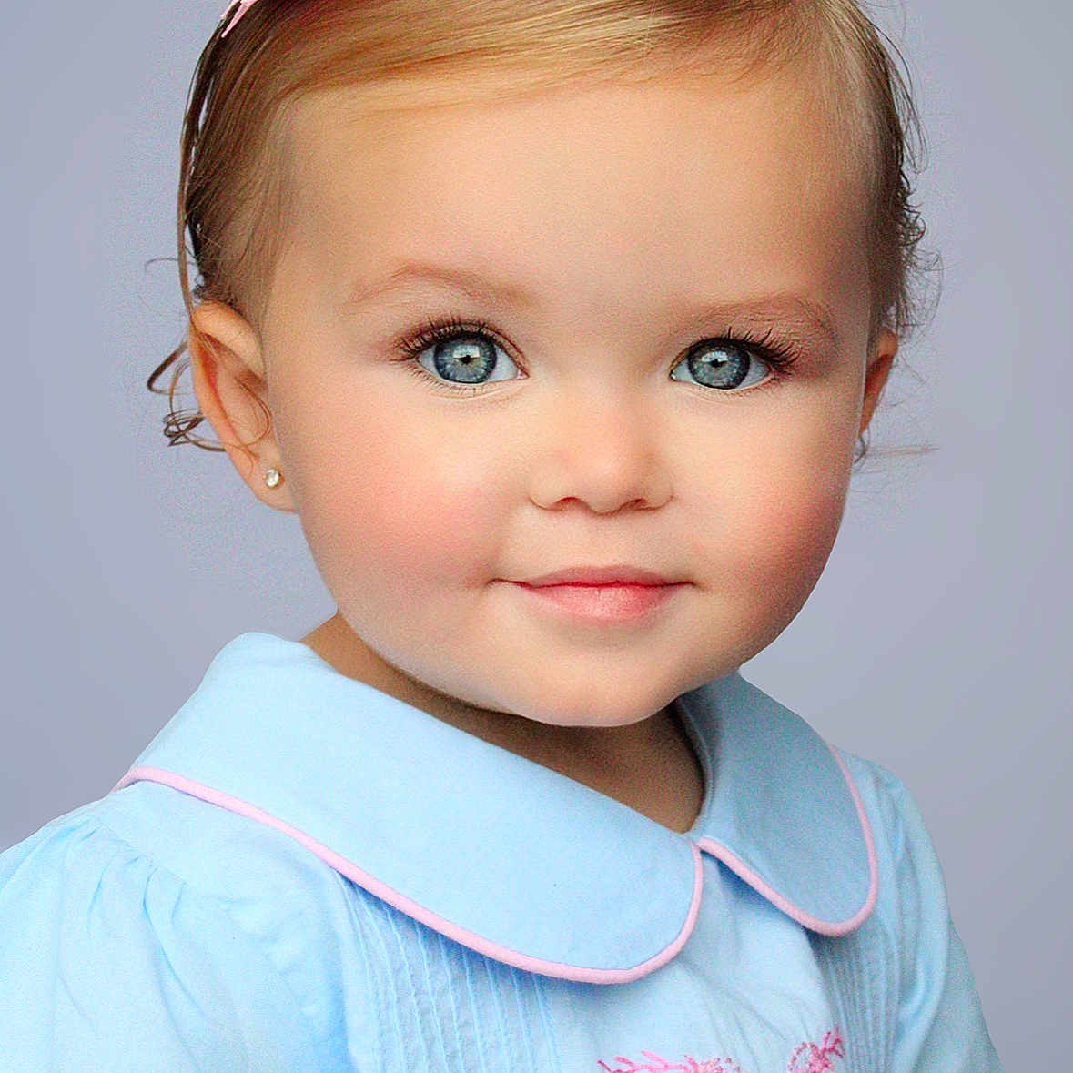 Drue is registered to the contest to win money with this photo: toddler, child, blue_eyes, pink_bow, pastel_dress, smiling, portrait, cute, baby, face, innocent, studio_photo, young_child, girl, eyelashes, soft_lighting, headshot, short_hair, clothing, adorable