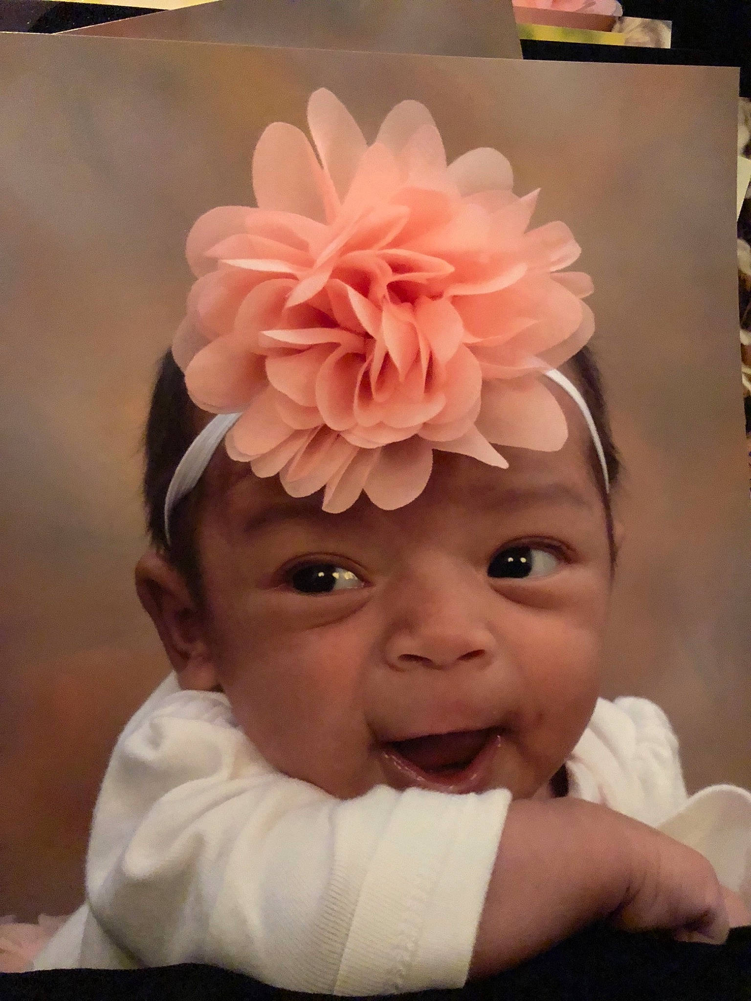 Leonna joined the competition — help win amazing prizes! cheek, child, ear, fashion_accessory, flower, forehead, girl, hair_accessory, head, headband, headgear, headpiece, headwear, infant, person, pink, product, rose_family, smile