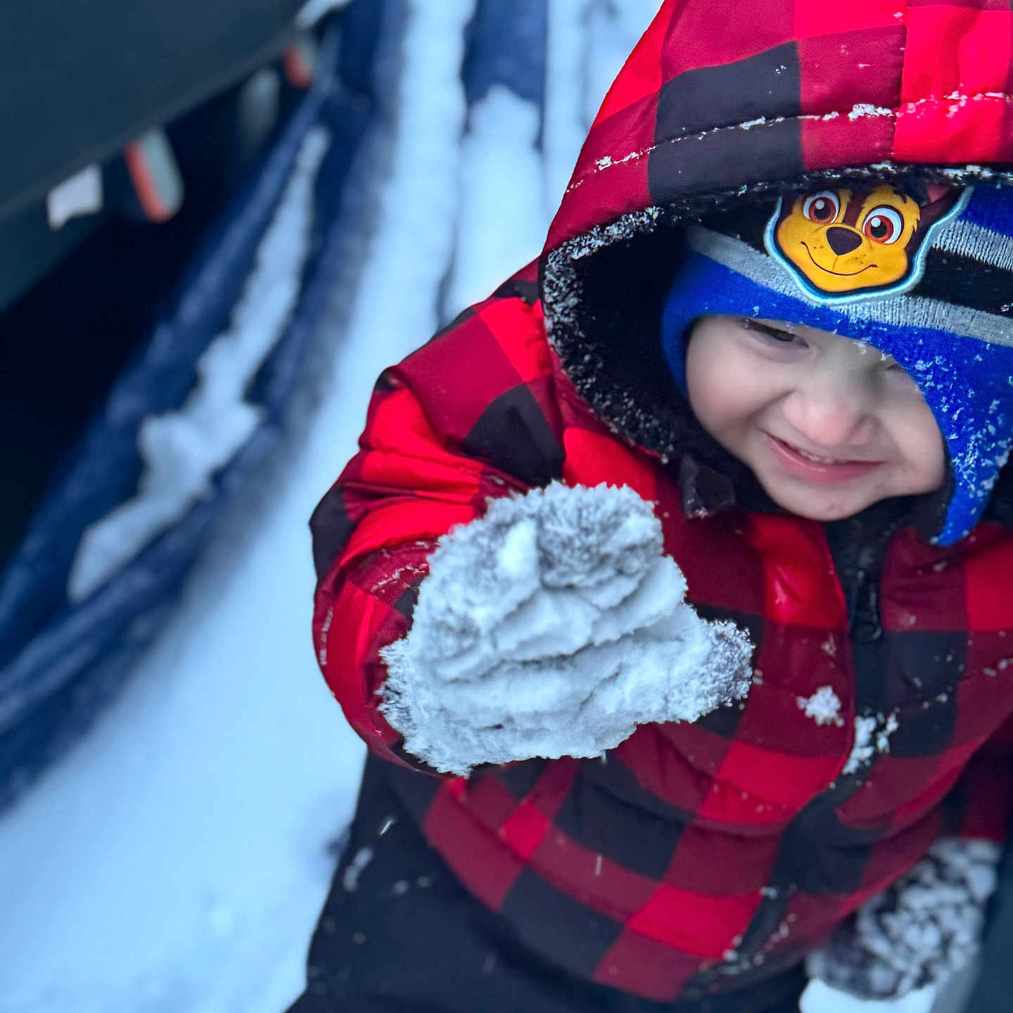 Mylin joined the competition — help win amazing prizes! black_pants, blue_hat, cartoon_character, child, closeup, cold_weather, face, gloves, happy, hood, outdoor, playful, red_jacket, smile, snow, snowball, snowy_background, winter, winter_clothing, winter_fun