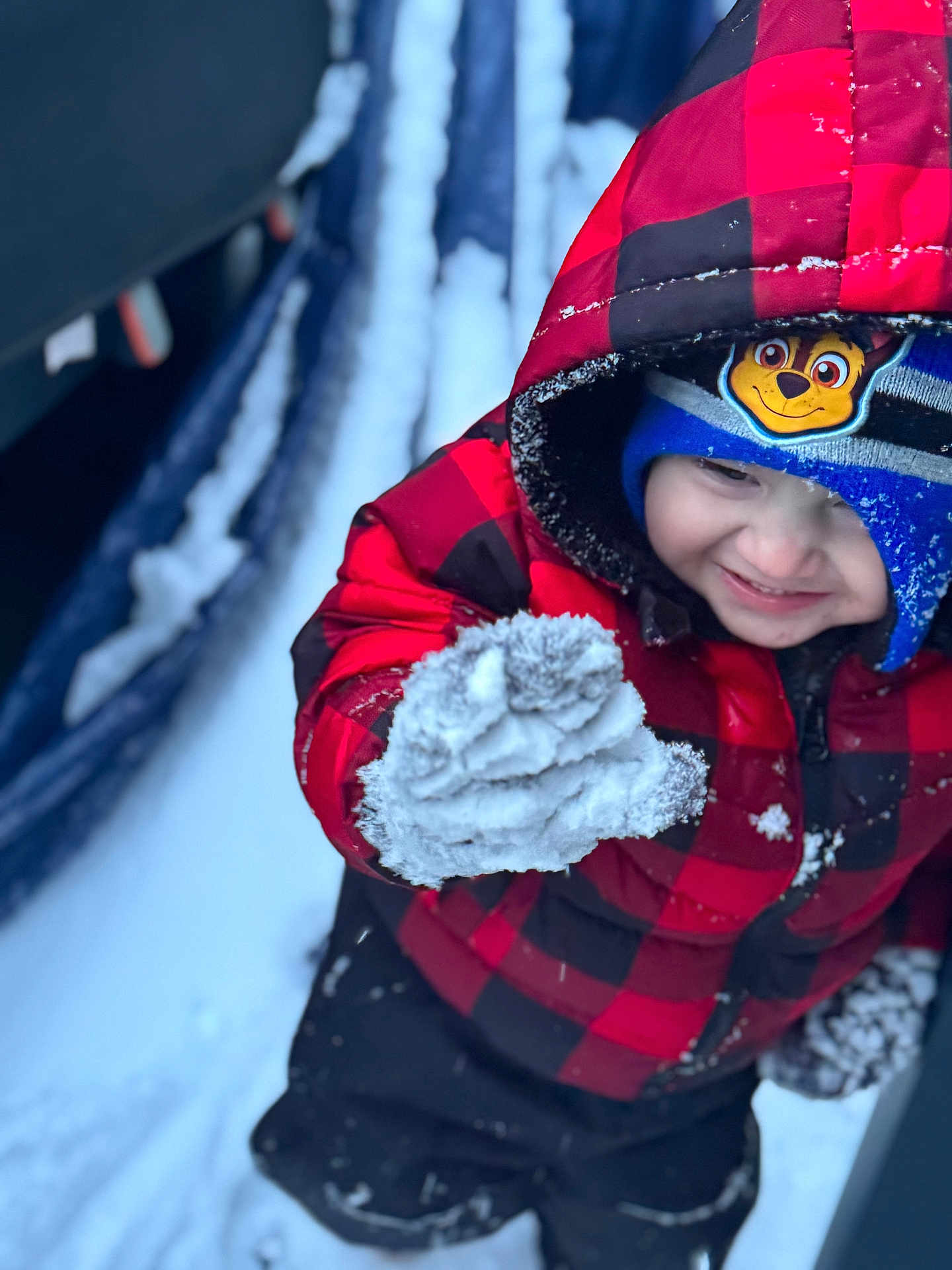 Mylin joined the competition — help win amazing prizes! black_pants, blue_hat, cartoon_character, child, closeup, cold_weather, face, gloves, happy, hood, outdoor, playful, red_jacket, smile, snow, snowball, snowy_background, winter, winter_clothing, winter_fun