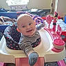 baby, child, infant, smiling, happy, walker, toy, minnie_mouse, pink, socks, striped_shirt, seated, indoor, playroom, nursery, blanket, window, furniture, portrait, family