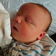 Maddex joined the competition — help win amazing prizes! newborn, baby, sleeping, face, infant, onesie, striped_clothing, bed, blanket, pacifier, soft, closeup, peaceful, rest, child, cute, portrait, skin, head, ear