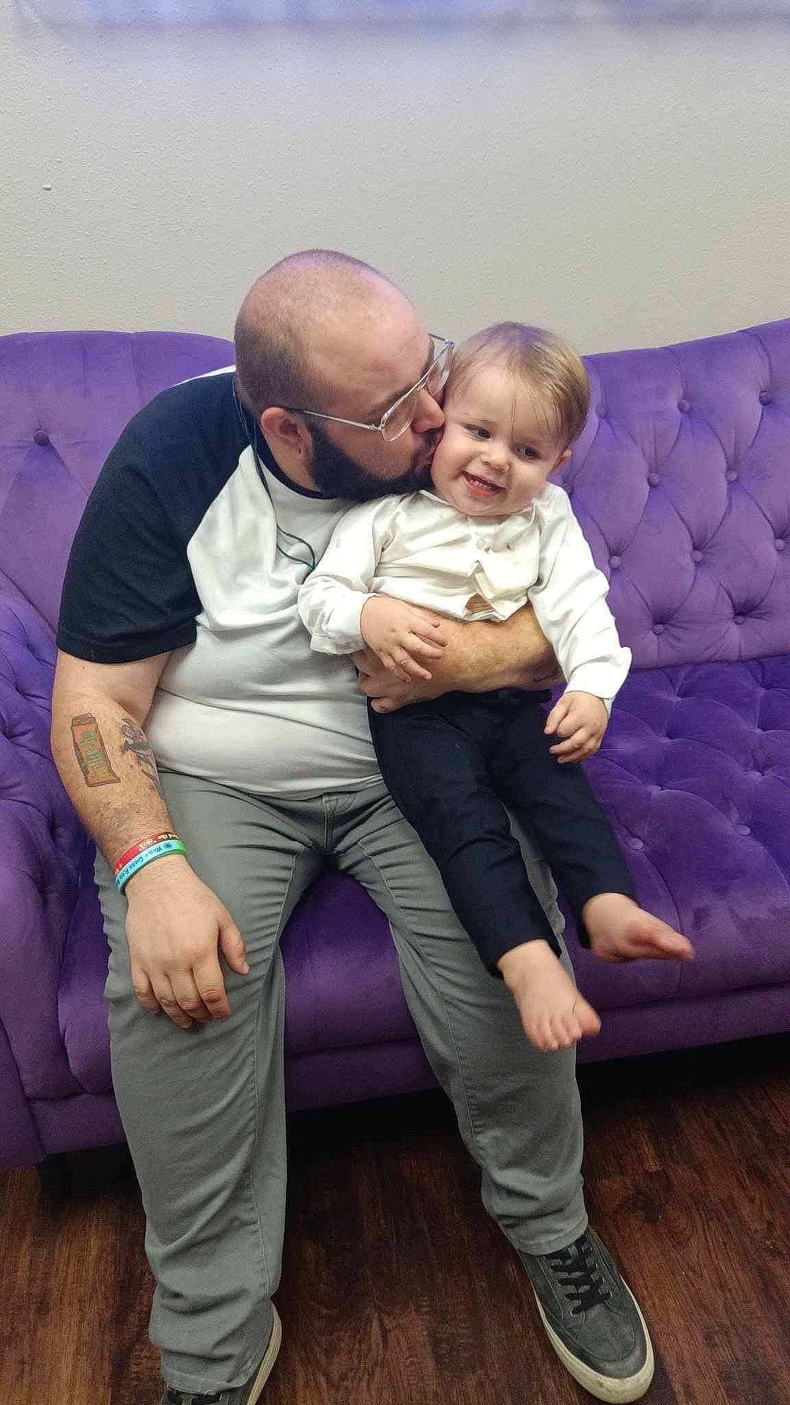 Chance joined the competition — help win amazing prizes! abdomen, baby, child, comfort, couch, event, eyewear, fun, gesture, glasses, hairstyle, happy, head, joy, person, pink, purple, sitting, sunglasses, thigh