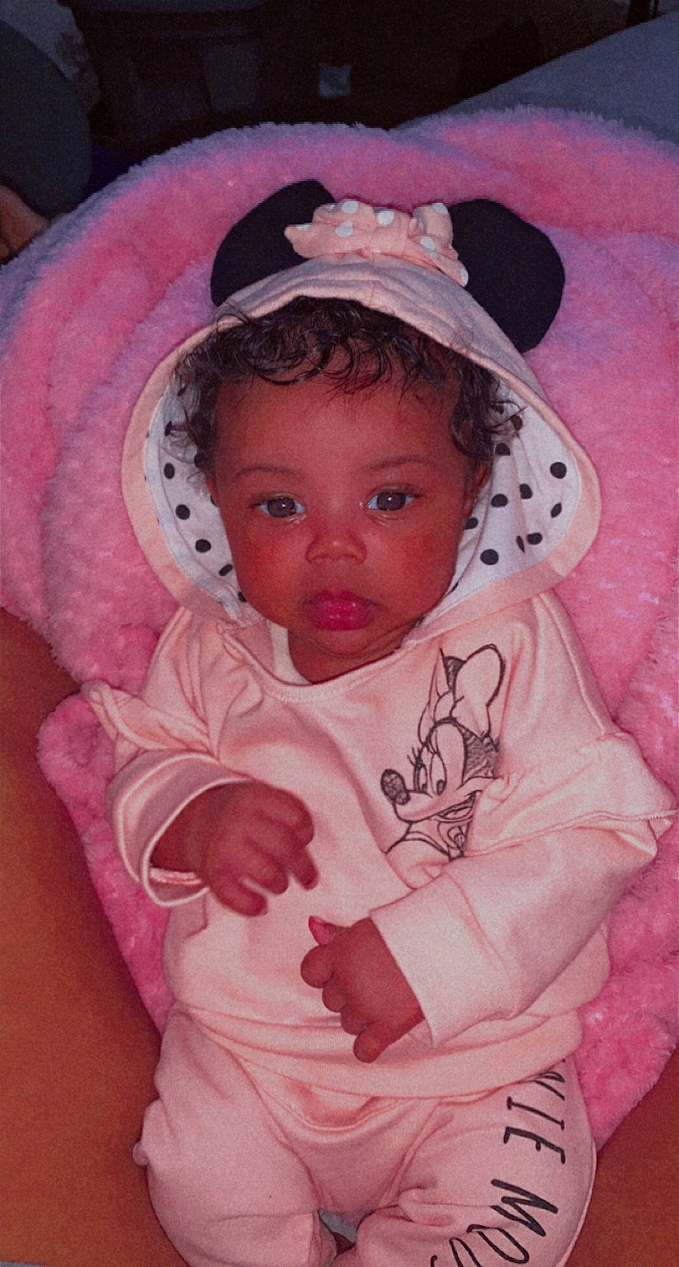 Kayhlani is registered to the contest to win money with this photo: baby, baby_toddler_clothing, beauty, cap, cheek, chin, comfort, eye, eyebrow, eyelash, headgear, iris, linens, lip, nose, person, pink, skin, sleeve, textile