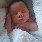 Nevaeh joined the competition — help win amazing prizes! baby, newborn, sleeping, blanket, soft, cozy, infant, face, peaceful, hands, wrapped, closeup, cute, resting, warm, portrait, child, indoors, relaxing, comfort