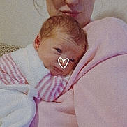 Kamelya participe au concours pour gagner de l'argent avec cette photo : baby, blanket, closeup, couch, cozy, cuddle, eyeglasses, face, family, glasses, heart_doodle, holding, infant, living_room, mother, newborn, pink, portrait, sweater, woman