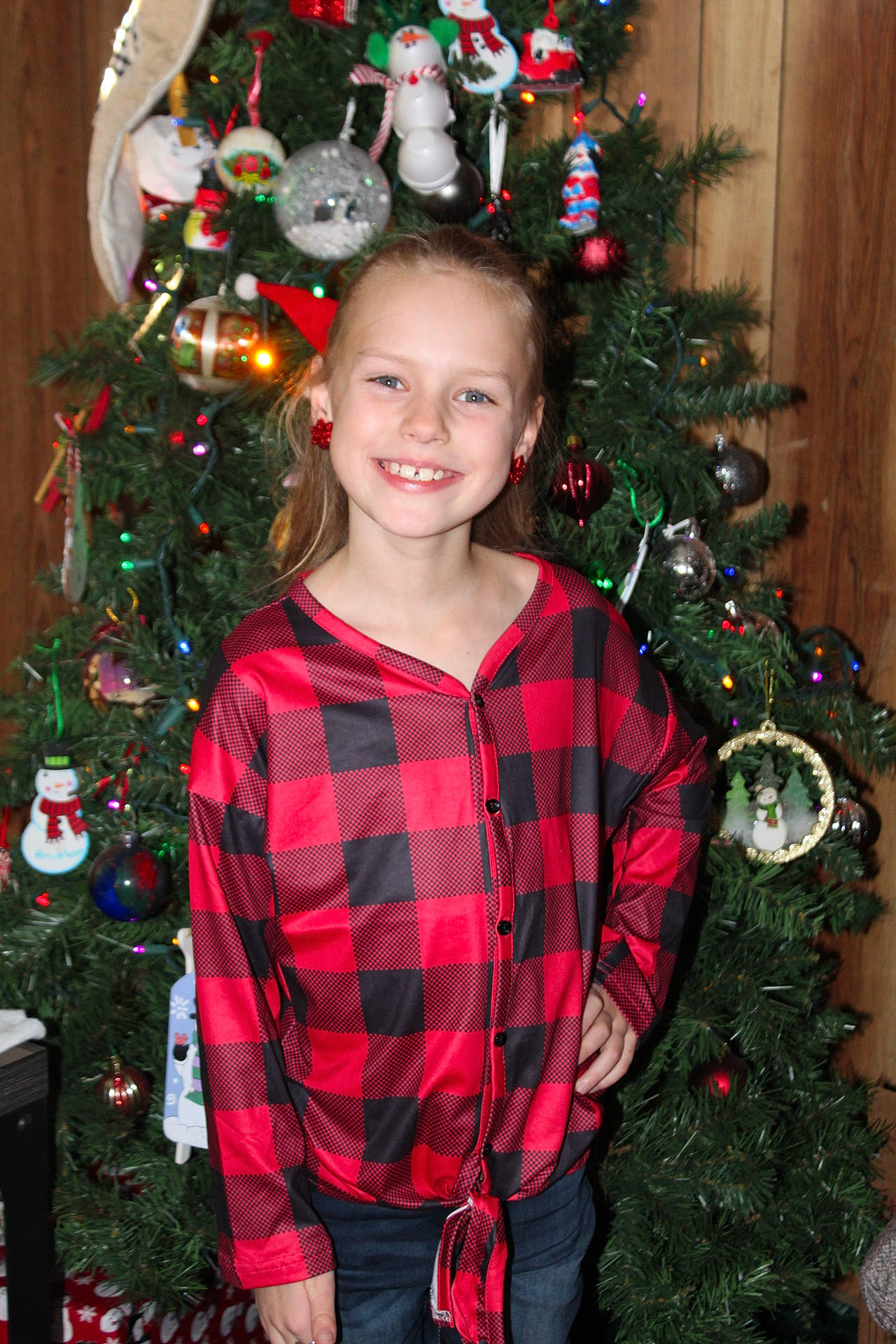 Izabell joined the competition — help win amazing prizes! christmas_ornament, christmas_tree, eye, face, facial_expression, green, hair, hairstyle, happy, head, holiday_ornament, human_body, joy, leaf, organ, person, photograph, red, sleeve, smile