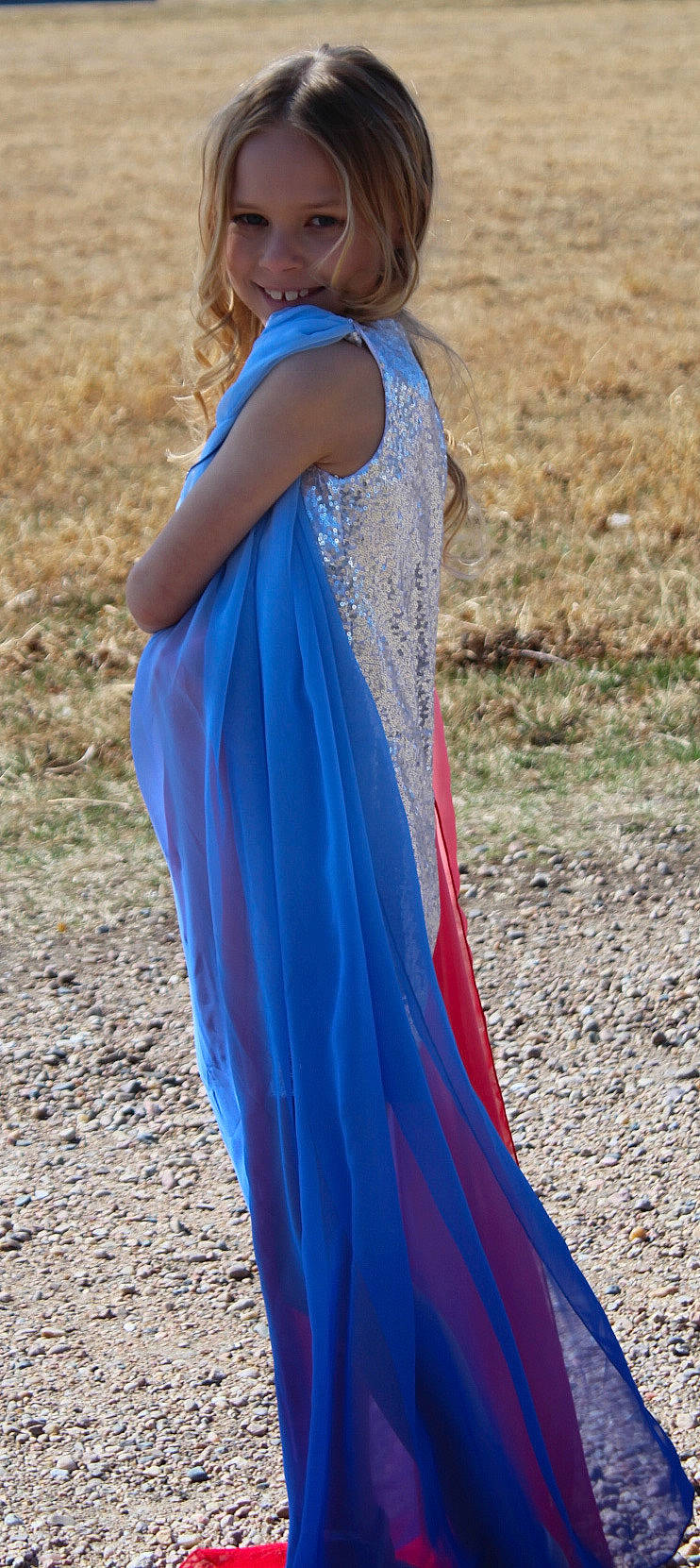 Izabell joined the competition — help win amazing prizes! blue, day_dress, electric_blue, fashion_accessory, fashion_design, formal_wear, gown, grass, grassland, human_leg, joy, long_hair, magenta, one_piece_garment, pattern, people_in_nature, person, shawl, sleeve, soil