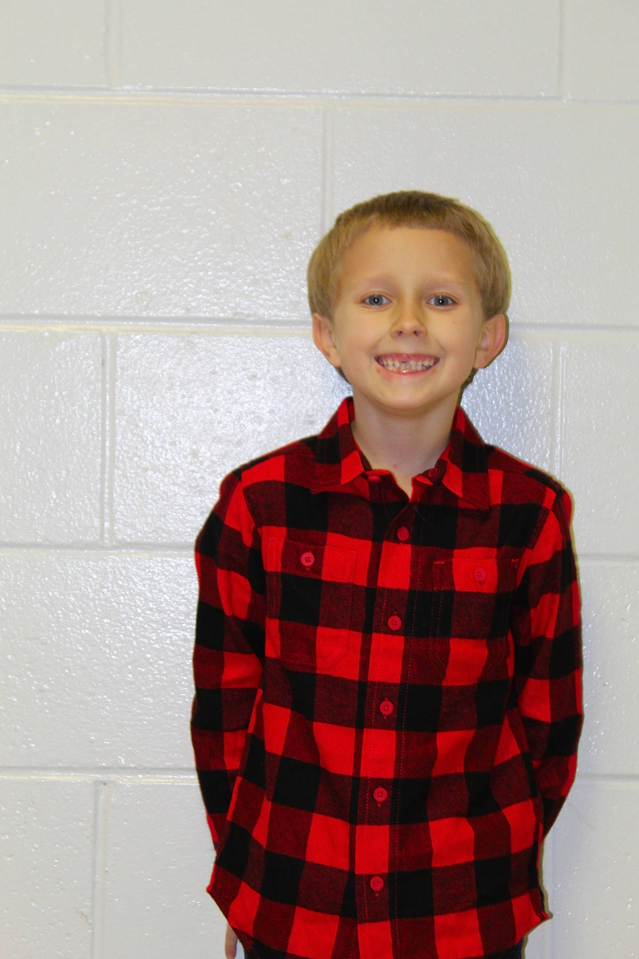 Jackson joined the competition — help win amazing prizes! arm, blazer, collar, dress_shirt, eye, face, facial_expression, hair, happy, head, human_body, joy, neck, outerwear, person, plaid, shirt, shoulder, sleeve, smile