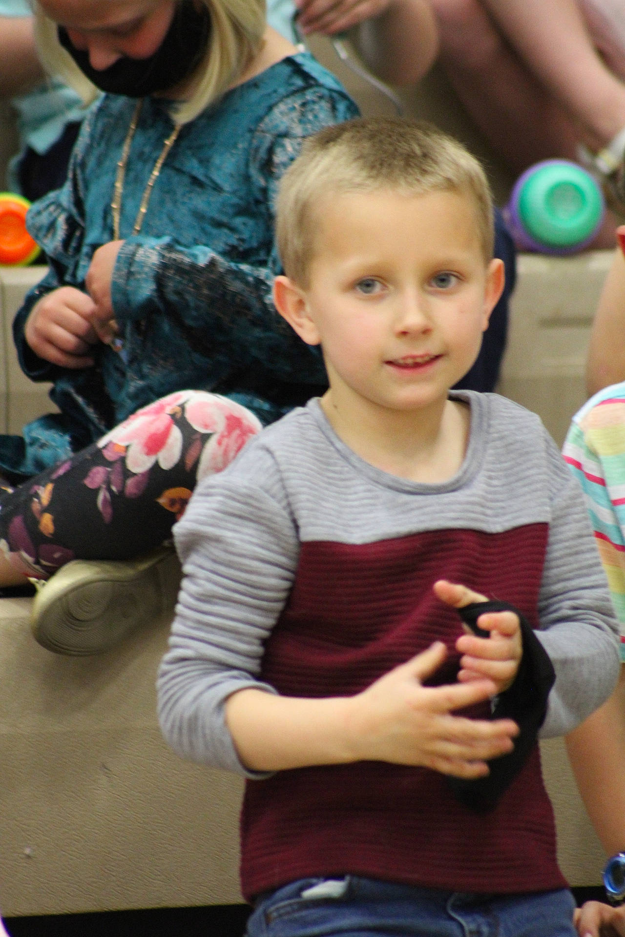 Jackson is registered to the contest to win money with this photo: adaptation, arm, child, clothing, event, eyewear, finger, fun, hand, happy, joint, leisure, organ, person, recreation, shoulder, skin, snapshot, standing, t_shirt