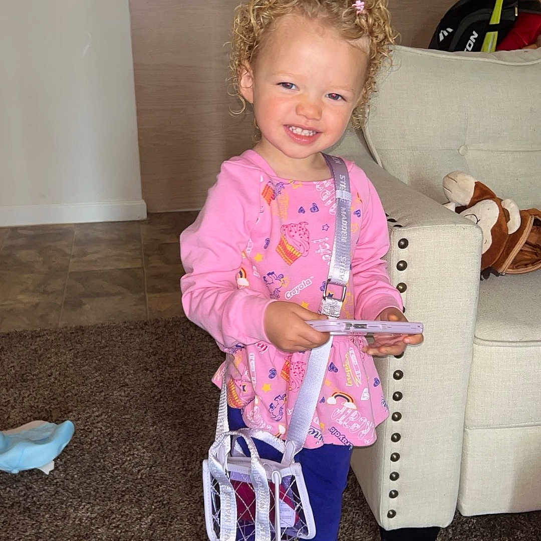 Avianna joined the competition — help win amazing prizes! appliance, child, clothing, couch, device, electricaldevice, face, female, footwear, furniture, girl, head, pants, person, photography, portrait, racket, refrigerator, shoe, sport