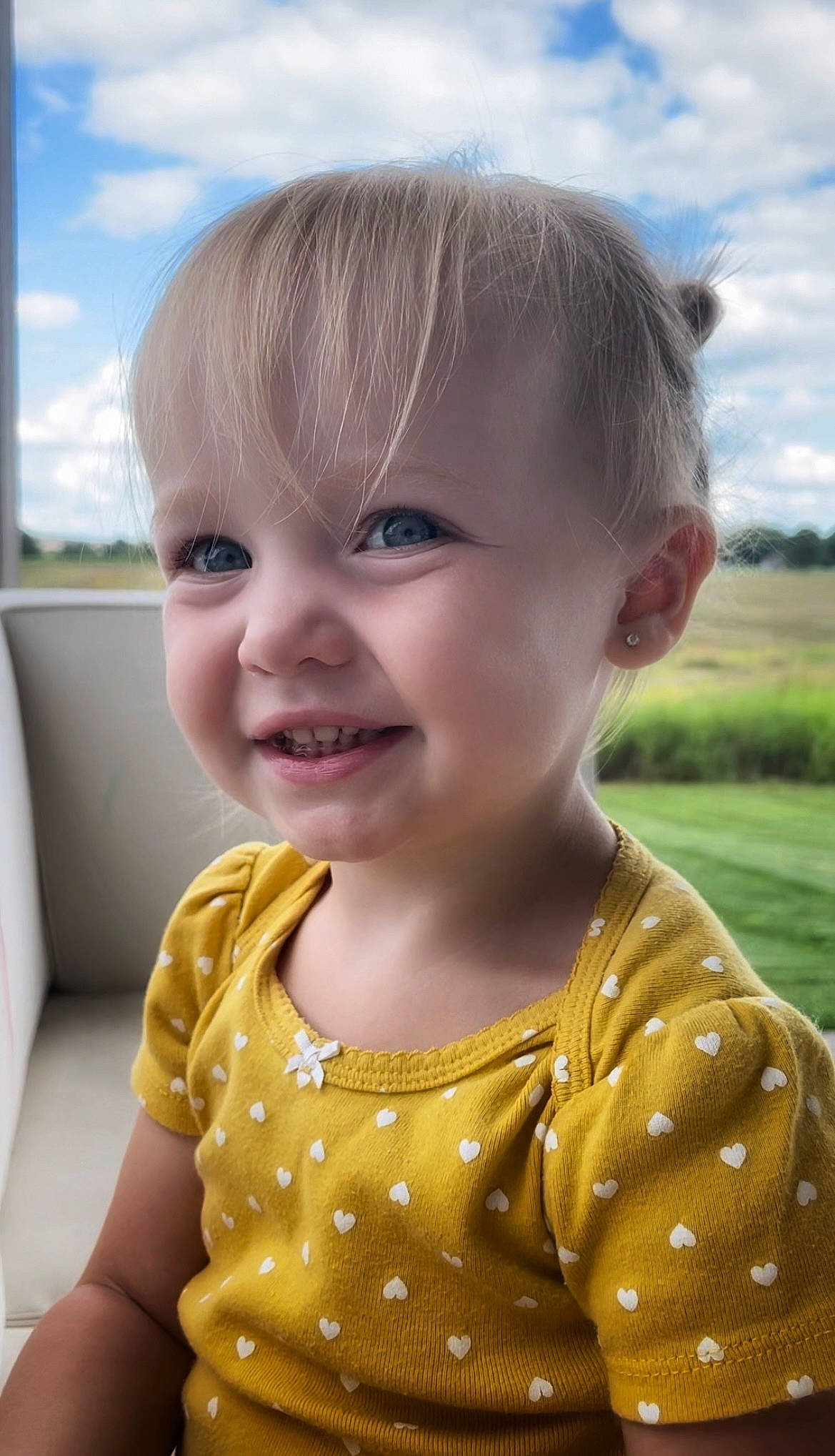 Isla joined the competition — help win amazing prizes! baby, baby_toddler_clothing, blond, cheek, child, cloud, eyelash, face, fun, grass, happy, iris, joy, lip, neck, nose, person, skin, sky, sleeve