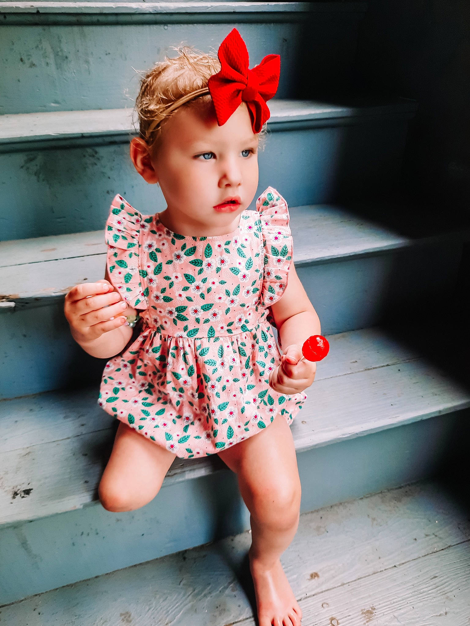 Elara is registered to the contest to win money with this photo: baby, baby_toddler_clothing, baseball_cap, cap, child, day_dress, dress, finger, flash_photography, happy, head, headwear, knee, leg, lip, one_piece_garment, person, pink, red, sleeve