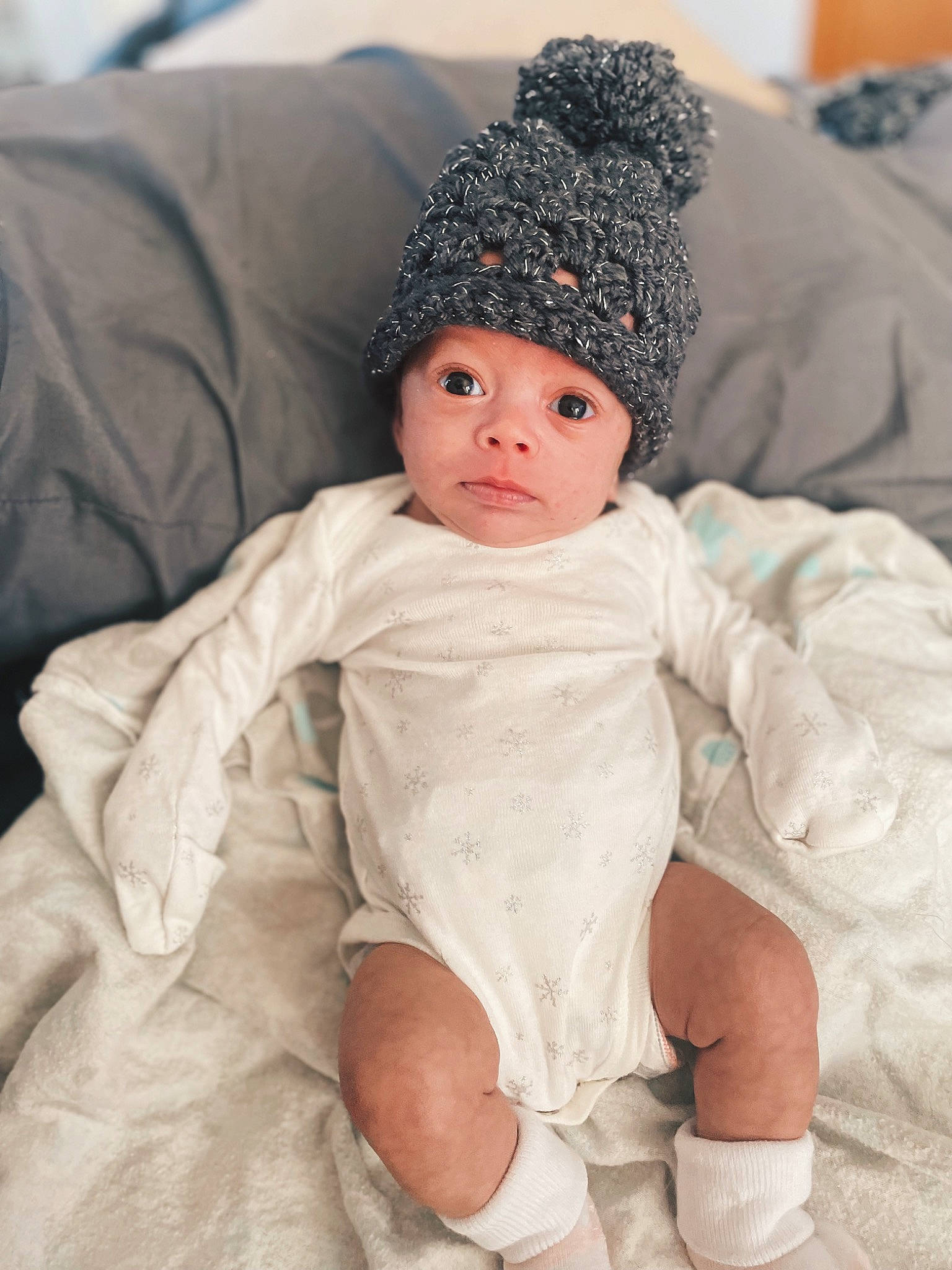 Kiana joined the competition — help win amazing prizes! baby, baby_toddler_clothing, cap, cheek, child, comfort, eye, face, fashion_accessory, fur, hat, head, headwear, human_body, knit_cap, lip, person, skin, sleeve, toddler
