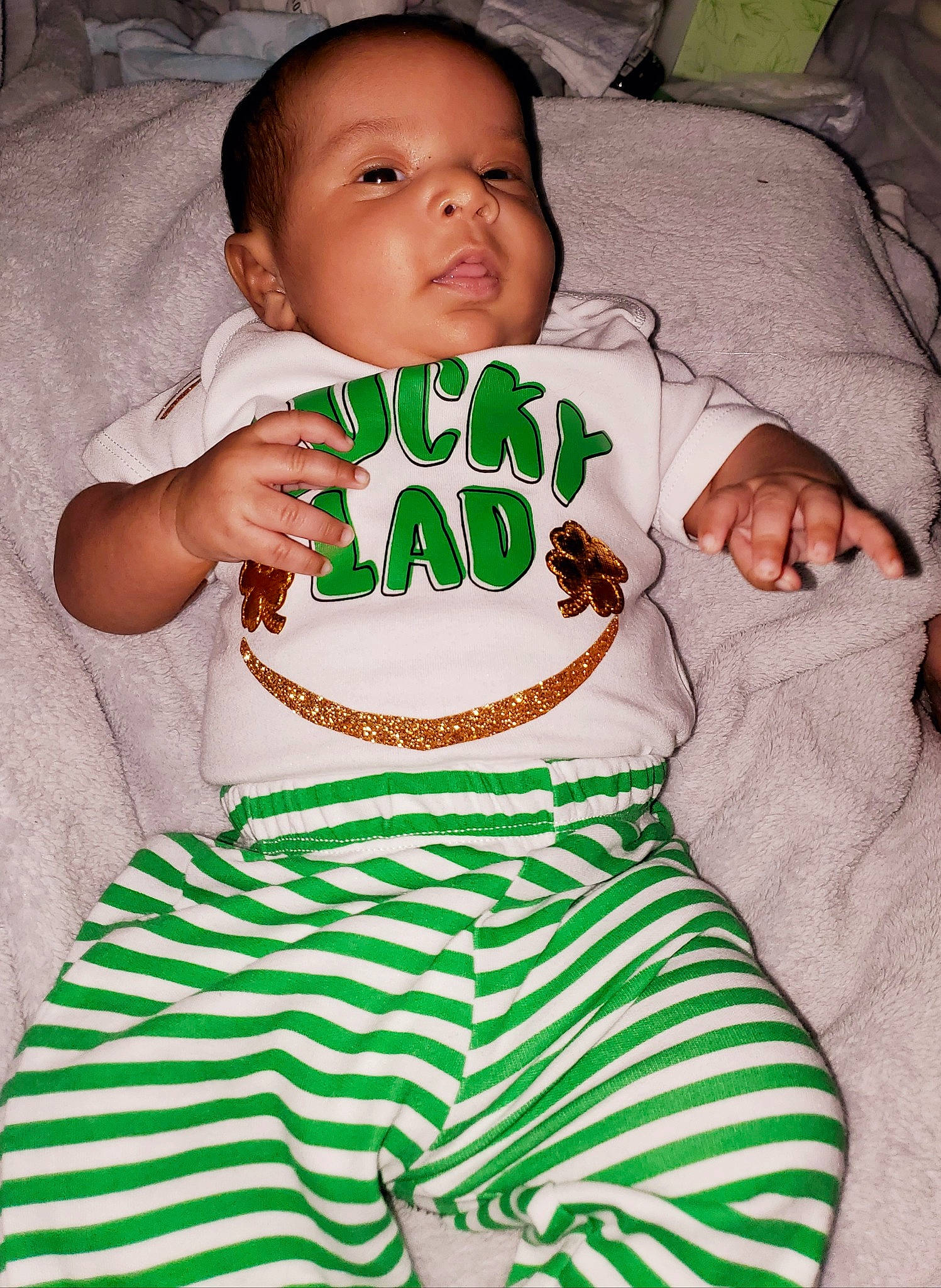 Kellen is registered to the contest to win money with this photo: baby, baby_products, baby_toddler_clothing, child, green, leaf, person, product, t_shirt, toddler