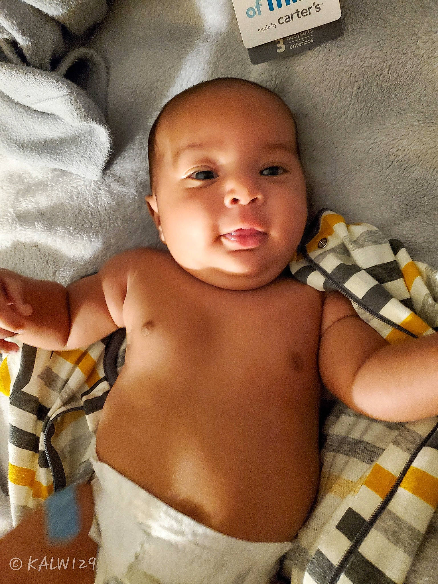 Kellen is registered to the contest to win money with this photo: abdomen, baby, cheek, child, eye, face, head, mouth, muscle, person, skin, toddler, trunk