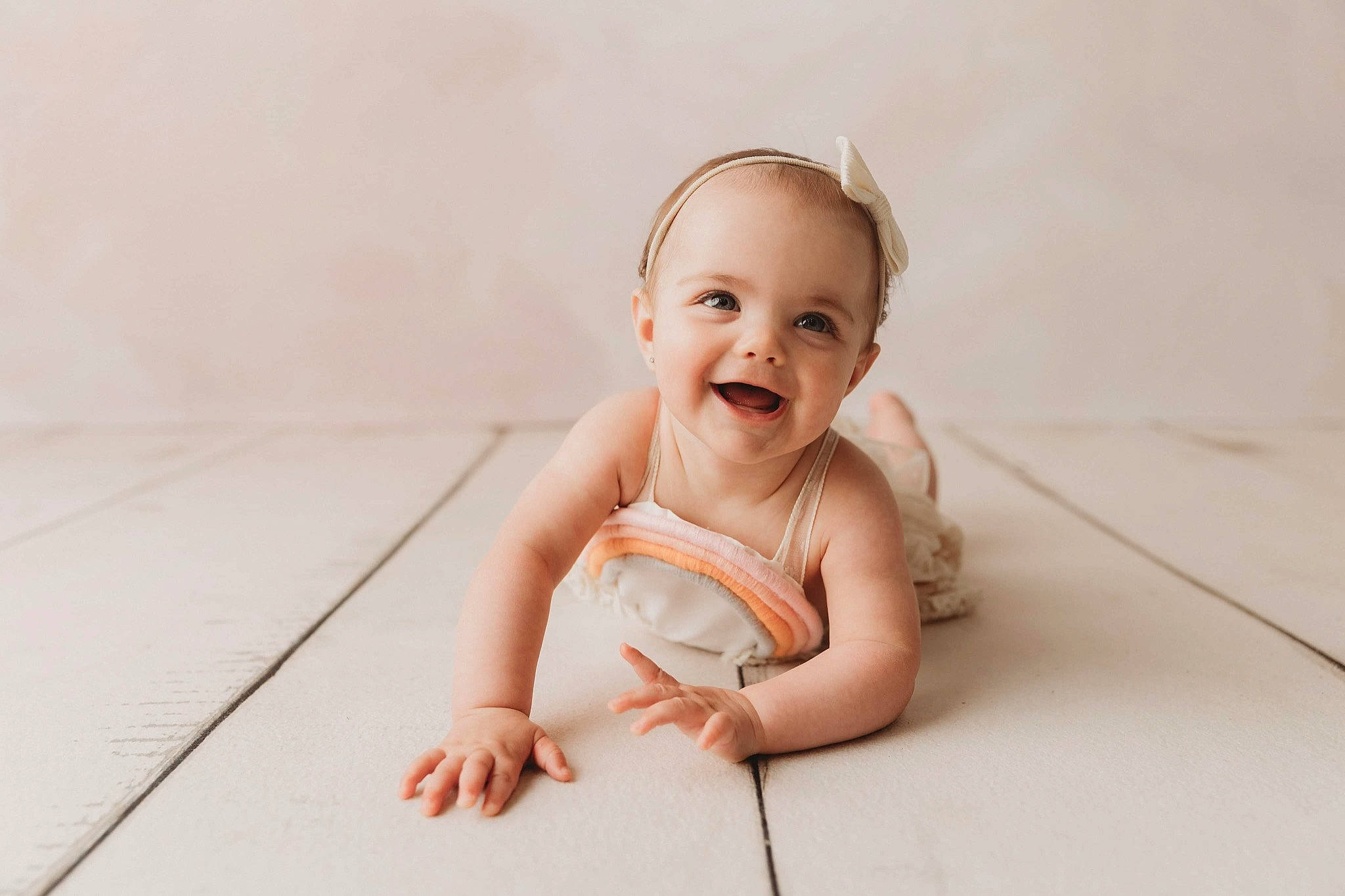 Brielle is registered to the contest to win money with this photo: baby, baby_toddler_clothing, cheek, child, comfort, flash_photography, flooring, foot, fun, grass, happy, hardwood, human_body, human_leg, joy, person, sitting, skin, smile, toddler