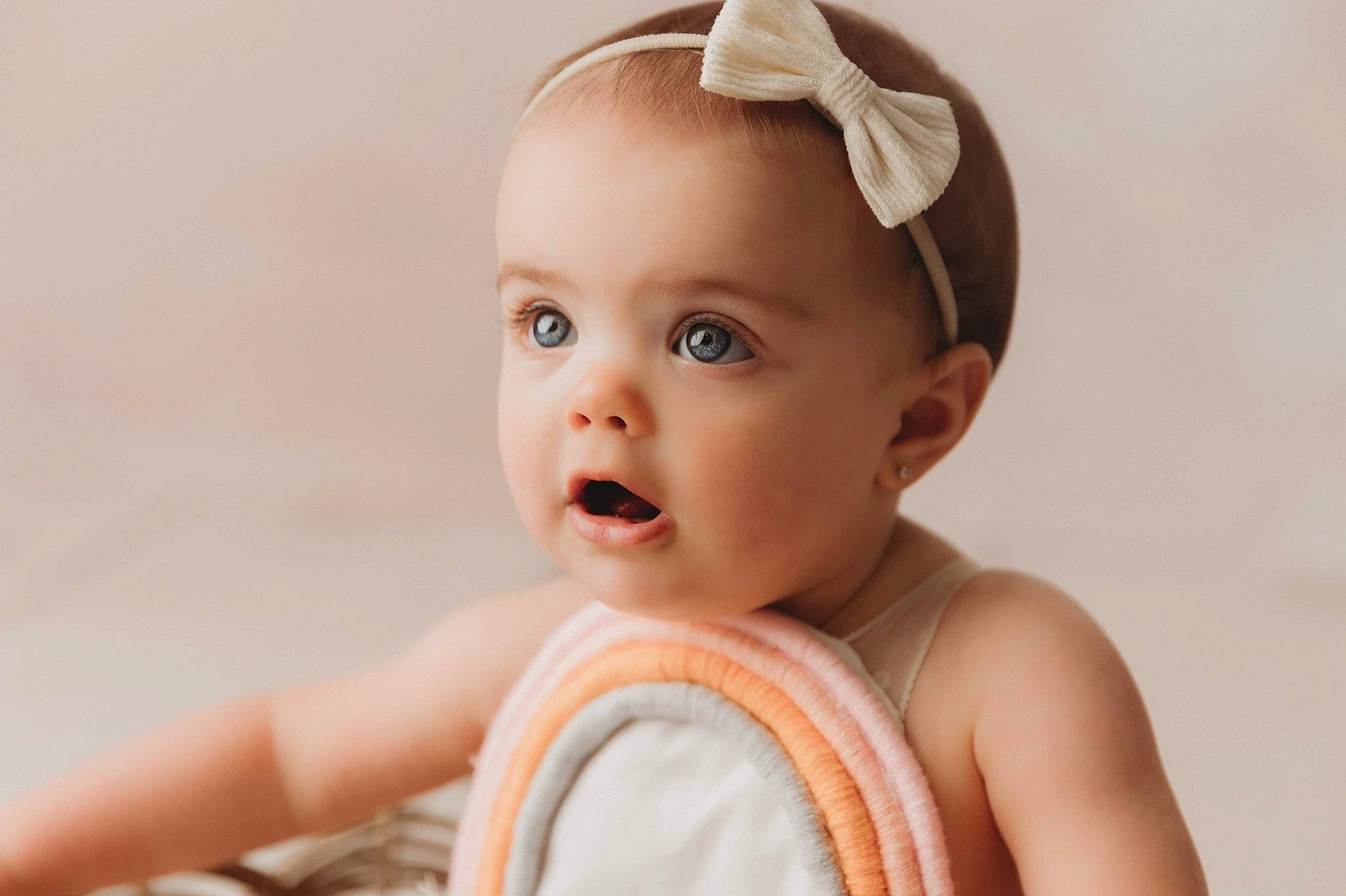 Brielle is registered to the contest to win money with this photo: baby, baby_toddler_clothing, cheek, child, close_up, comfort, ear, eyelash, fashion_accessory, flash_photography, gesture, happy, headpiece, iris, lip, nose, person, skin, sleeve, smile