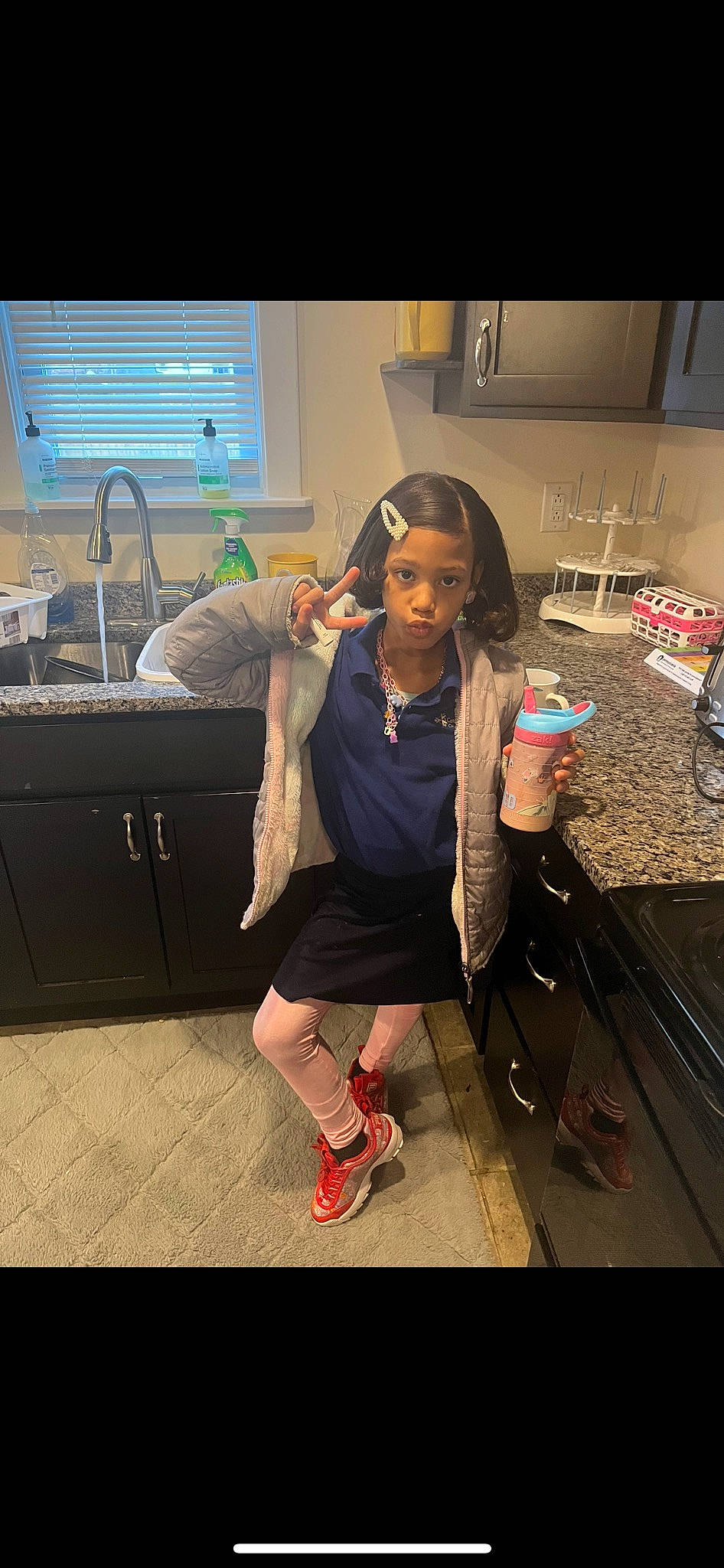 Moon is registered to the contest to win money with this photo: audio_equipment, automotive_design, bag, chair, countertop, electronic_device, event, eyewear, fashion_design, flooring, fun, gadget, human_leg, knee, leg, long_hair, luggage_and_bags, person, selfie, sitting