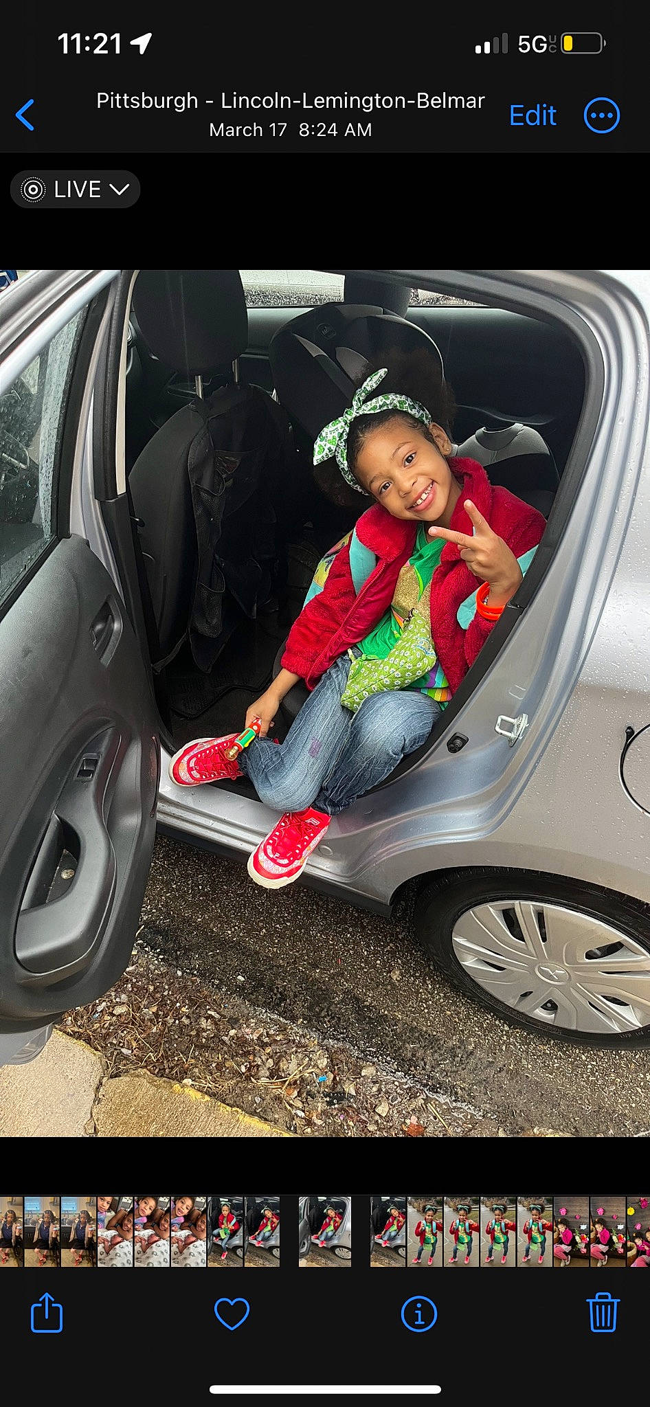 Moon is registered to the contest to win money with this photo: alloy_wheel, automotive_design, automotive_exterior, automotive_lighting, automotive_tire, car, door, hubcap, joy, mode_of_transport, motor_vehicle, person, plant, shoe, smile, sneakers, tire, trunk, vehicle, vehicle_door