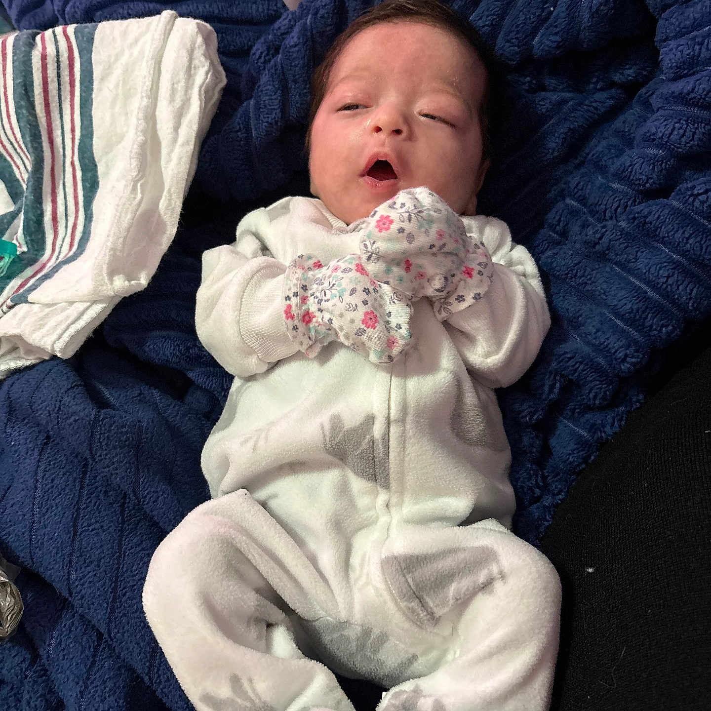 Sawyer joined the competition — help win amazing prizes! baby, blanket, child, clothing, comfort, cozy, cute, face, home, indoor, infant, lying_down, mittens, newborn, onesie, person, plush, resting, sleepy, soft_fabric