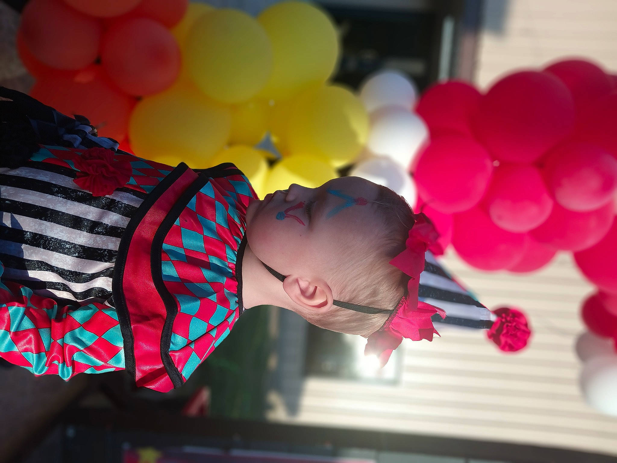 Isiah joined the competition — help win amazing prizes! balloon, child, dress, electric_blue, entertainment, event, fun, happy, human_body, leisure, light, magenta, party, party_supply, performing_arts, person, pink, red, snapshot, toddler
