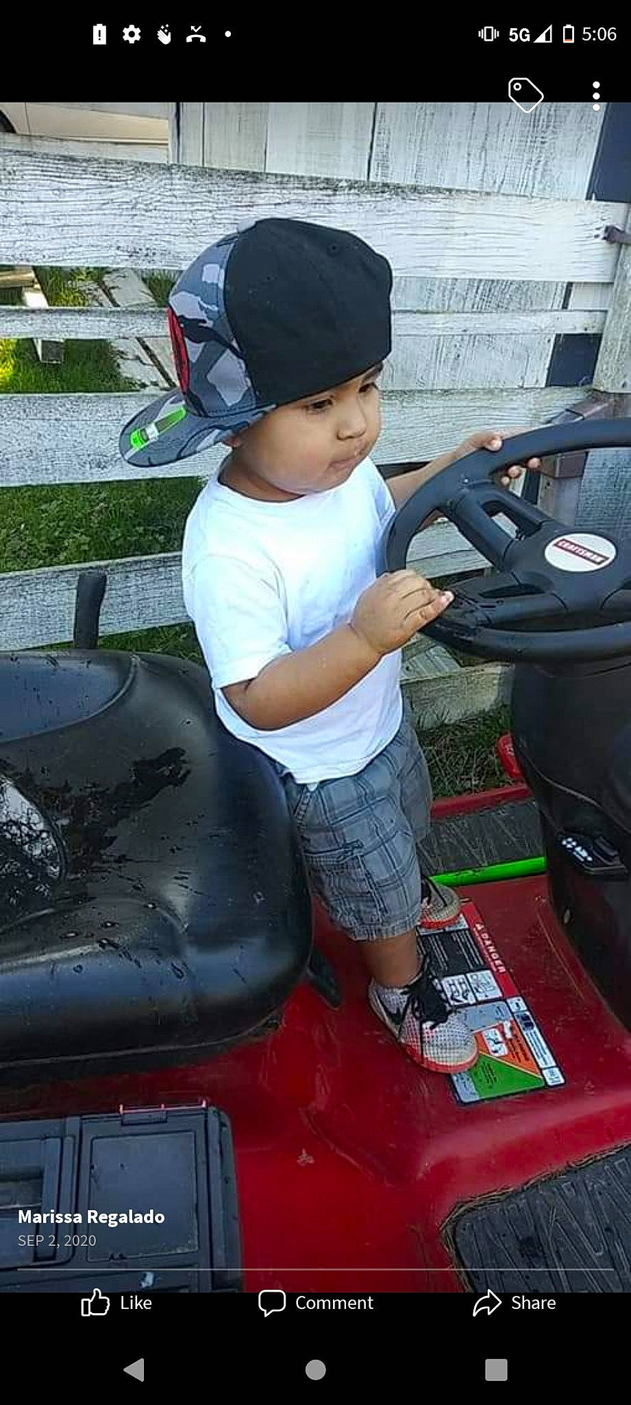 Manuel is registered to the contest to win money with this photo: asphalt, auto_part, automotive_design, automotive_exterior, automotive_tire, automotive_wheel_system, baseball_cap, bumper, cap, fun, hat, headwear, leisure, motor_vehicle, person, shorts, sneakers, steering_wheel, t_shirt, toddler
