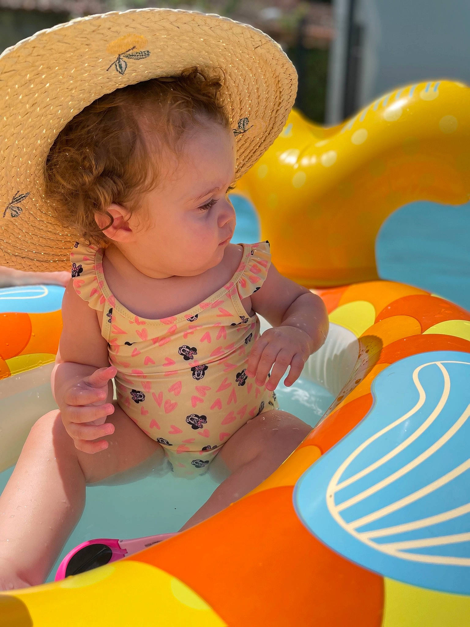 Kelsy participe au concours pour gagner de l'argent avec cette photo : arm, baby, baby_playing_with_toys, baby_toddler_clothing, cap, cheek, finger, fun, happy, hat, human_body, leisure, nose, orange, organ, person, product, recreation, skin, sun_hat