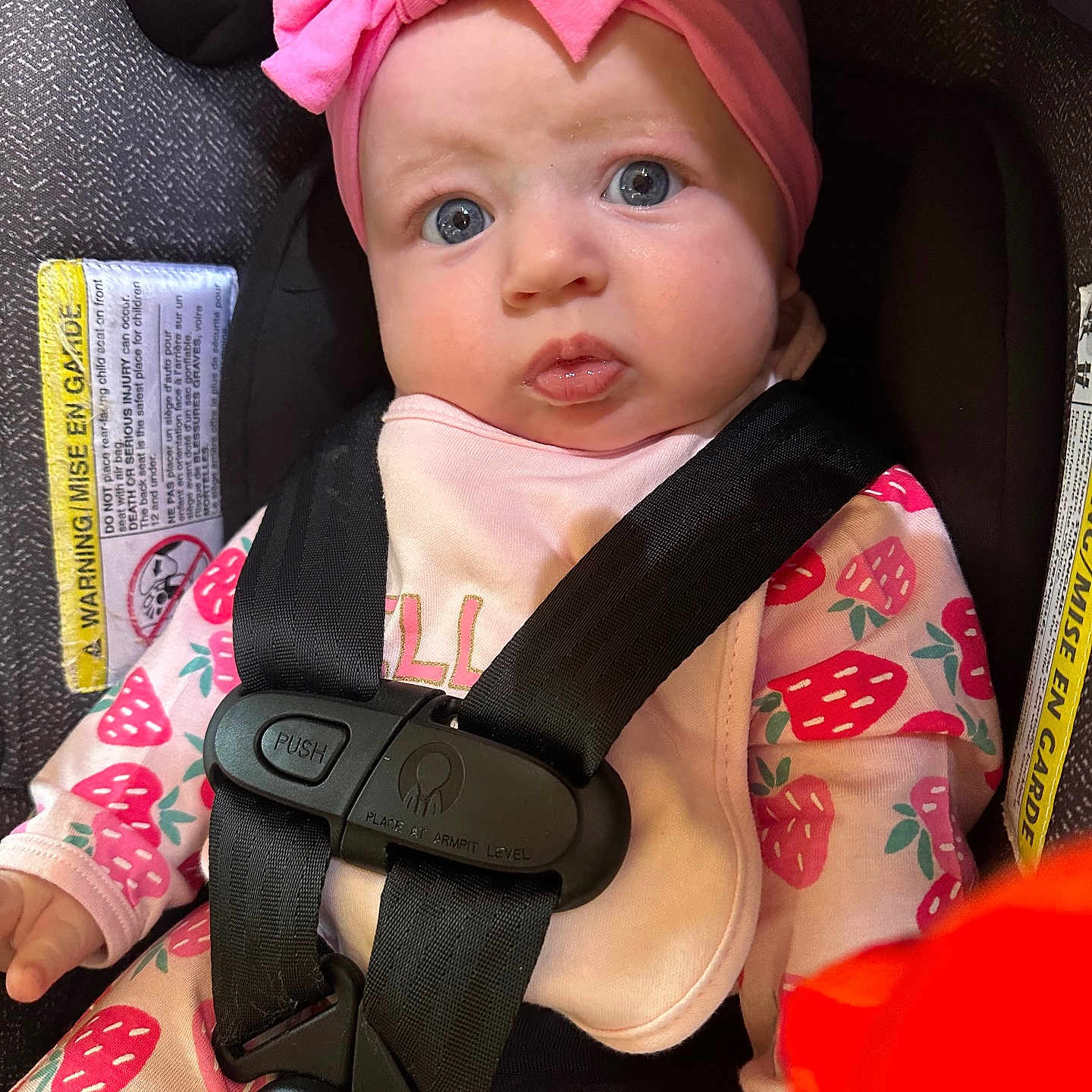 Willow is registered to the contest to win money with this photo: accessories, baby, belt, bonnet, car, car_interior, carseat, clothing, costume, cushion, dress, face, hat, head, homedecor, person, photography, portrait, transportation, vehicle