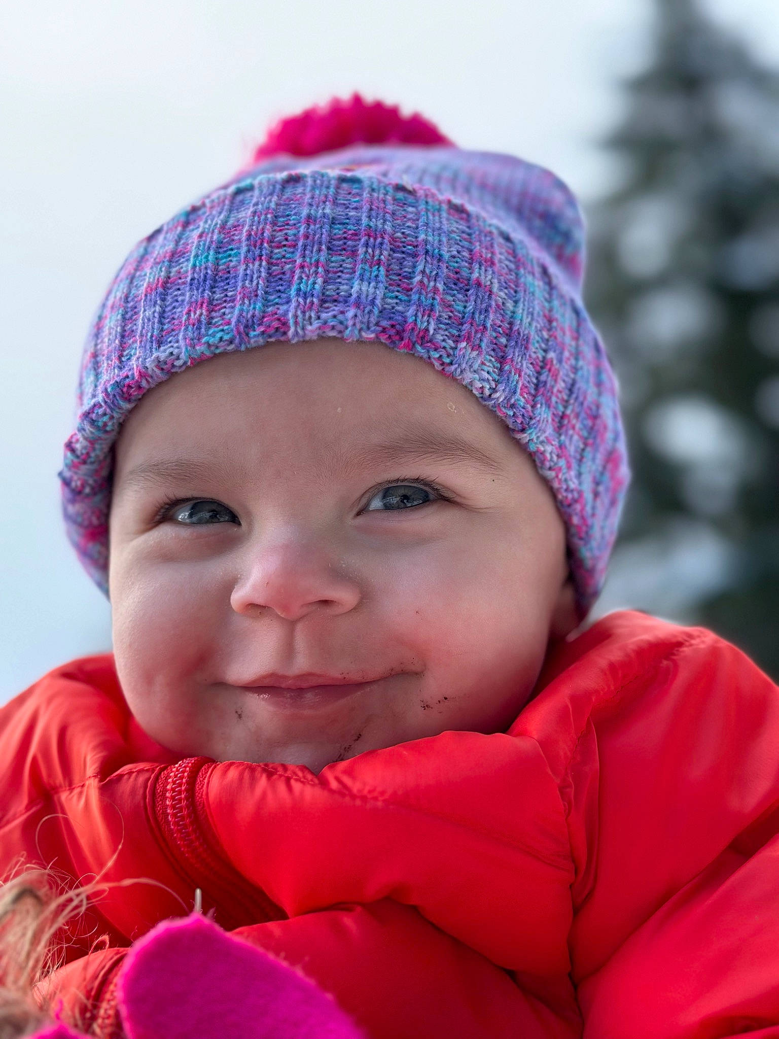 Aleyah is registered to the contest to win money with this photo: baby, cap, cheek, child, clothing, electric_blue, facial_expression, fun, happy, headwear, joy, knit_cap, leisure, lip, magenta, outerwear, person, pink, red, sky