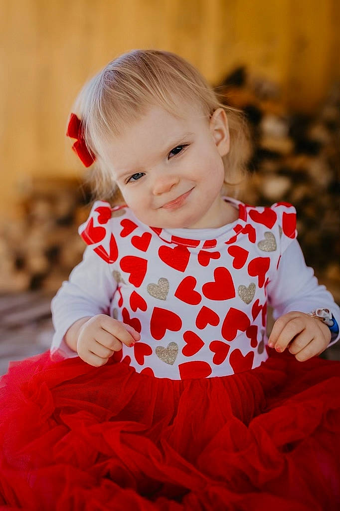 Lorelei joined the competition — help win amazing prizes! baby_toddler_clothing, child, collar, day_dress, dress, event, flash_photography, fun, grass, happy, joy, leisure, magenta, one_piece_garment, pattern, person, pink, portrait_photography, sitting, sleeve