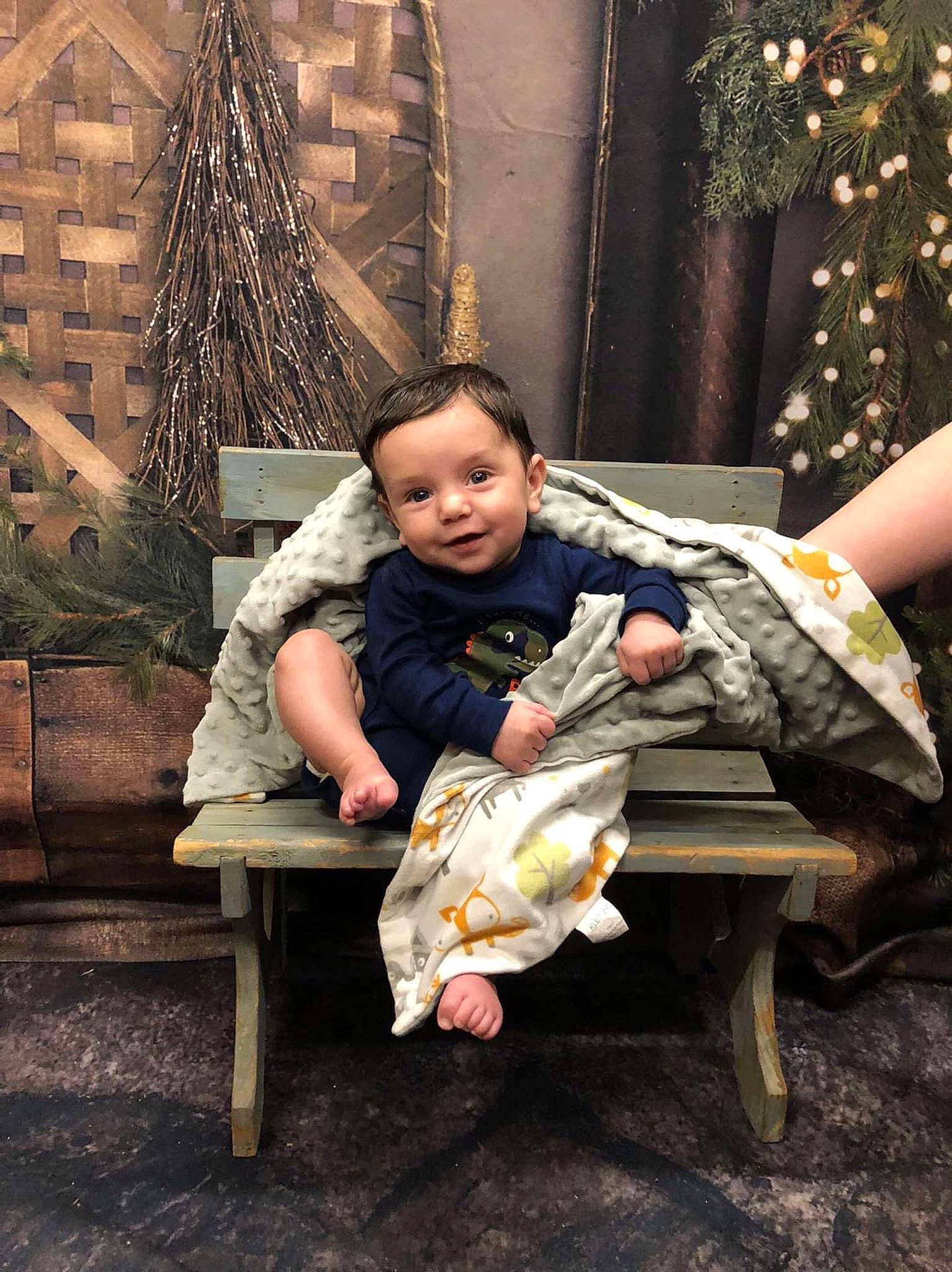 Hayze is registered to the contest to win money with this photo: baby, child, comfort, flash_photography, foot, fun, hairstyle, human, human_body, human_leg, joy, lap, leisure, person, room, sandal, sitting, sneakers, standing, toddler