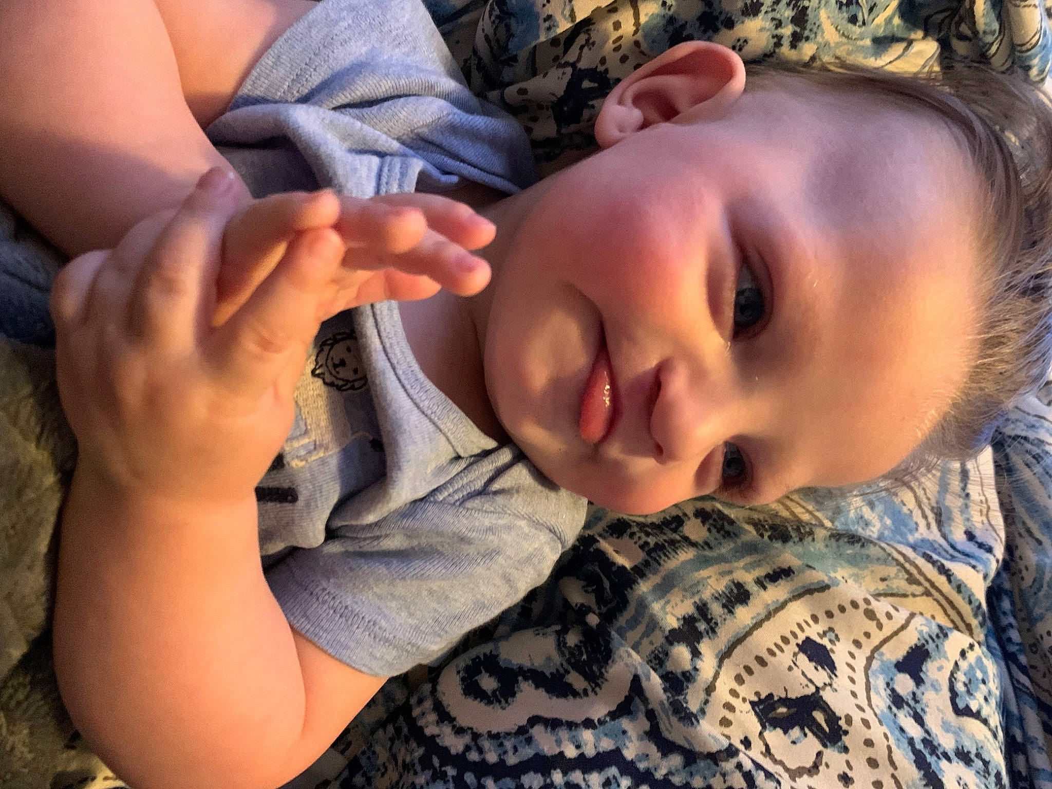 Donovan is registered to the contest to win money with this photo: child, comfort, eyelash, finger, gesture, grass, hand, happy, joy, lip, mouth, nail, neck, nose, pattern, person, plant, skin, smile, thumb