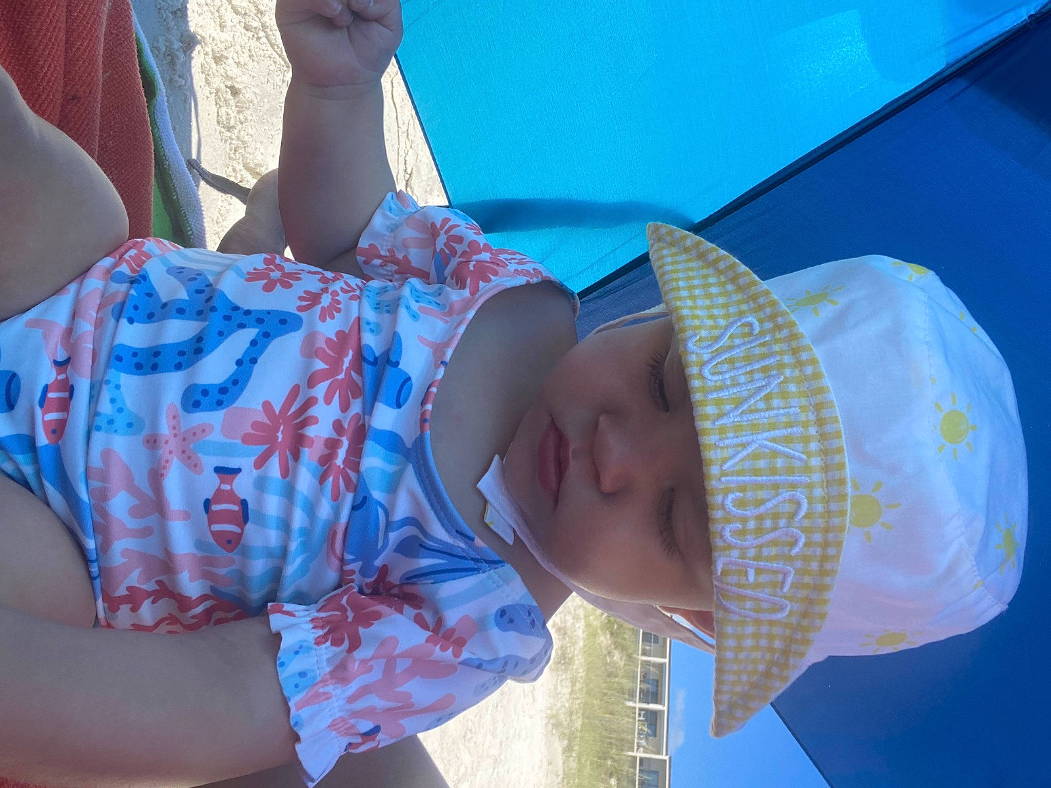 Cali is registered to the contest to win money with this photo: arm, azure, blue, elbow, finger, fun, gesture, hand, happy, hat, headwear, human, human_body, leisure, organ, person, skin, summer, sun_hat, textile