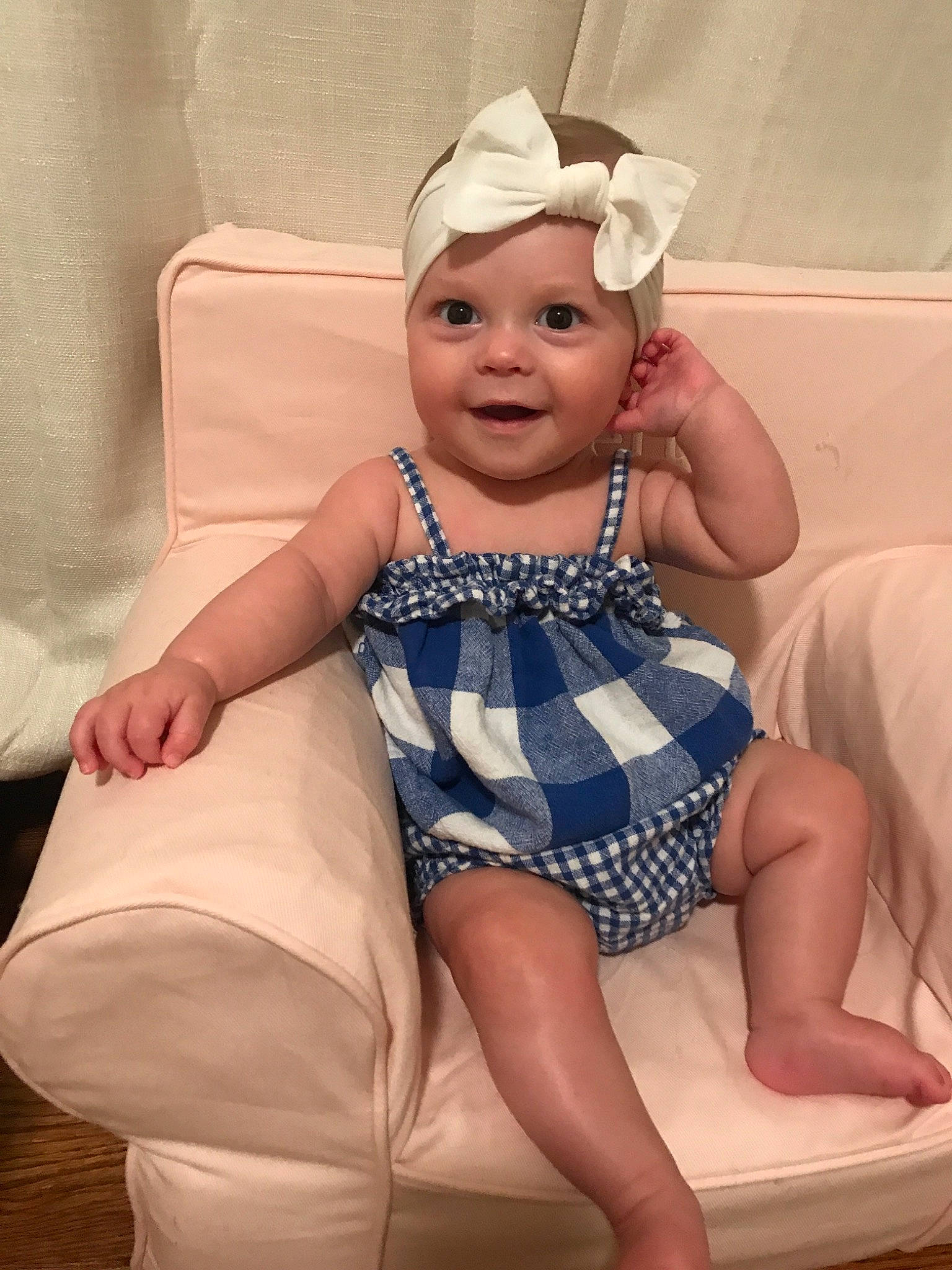 Betty joined the competition — help win amazing prizes! arm, baby, baby_toddler_clothing, child, ear, facial_expression, hair_accessory, head, headgear, headwear, leg, person, sitting, smile, toddler