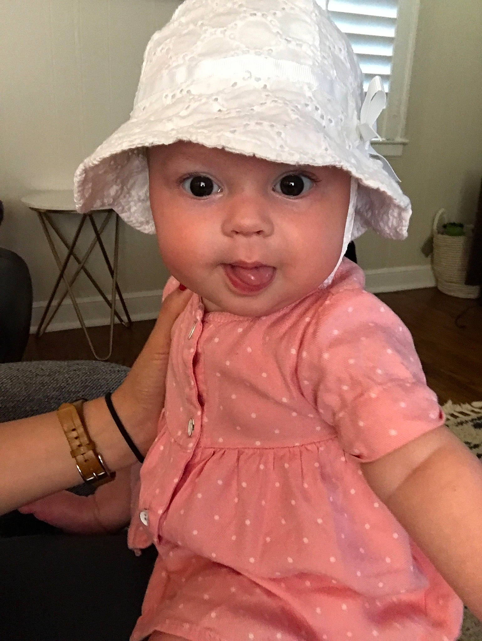 Betty is registered to the contest to win money with this photo: baby, bonnet, cheek, child, clothing, fashion_accessory, hat, headgear, headwear, lip, person, pink, skin, sun_hat, toddler
