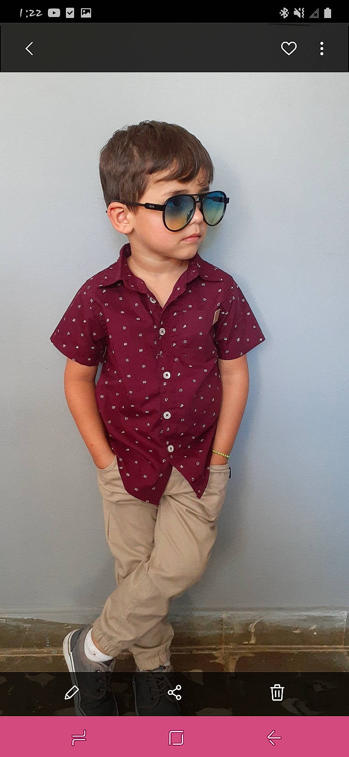 Matthew is registered to the contest to win money with this photo: child, child_model, clothing, cool, design, dress_shirt, eyewear, glasses, neck, outerwear, pattern, person, plaid, pocket, shirt, sleeve, standing, sunglasses, t_shirt, toddler