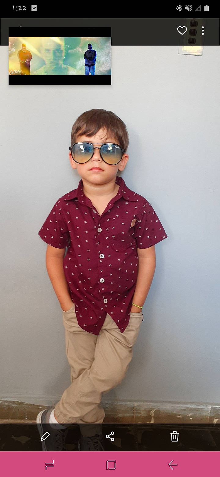 Matthew is registered to the contest to win money with this photo: cheek, child, child_model, clothing, cool, design, eyewear, forehead, glasses, neck, outerwear, pattern, person, polka_dot, shoulder, sleeve, standing, sunglasses, t_shirt, toddler