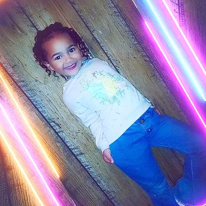 Jasmine joined the competition — help win amazing prizes! boy, child, clothing, curlyhair, face, hair, happy, head, jeans, light, male, neon, pants, person, photography, portrait, purple, sleeve, smile