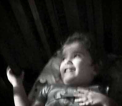 Eden is registered to the contest to win money with this photo: baby, darkness, elbow, entertainment, event, flash_photography, fun, gesture, happy, jaw, laugh, midnight, monochrome, monochrome_photography, person, portrait_photography, sitting, smile, still_life_photography, thumb