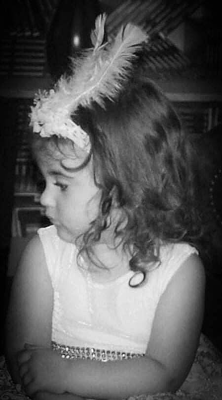 Eden is registered to the contest to win money with this photo: beauty, black, black_and_white, ear, facial_expression, flash_photography, fun, gesture, hair, hairstyle, happy, monochrome, monochrome_photography, organ, people, person, smile, standing, style, toddler