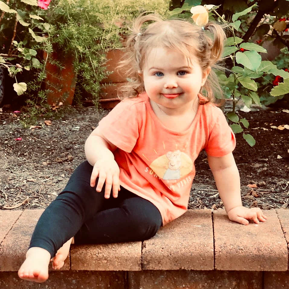 Aurora is registered to the contest to win money with this photo: child, clothing, face, female, girl, head, herbal, herbs, jar, leaf, pants, person, photography, plant, planter, portrait, pottedplant, pottery, sitting, vase