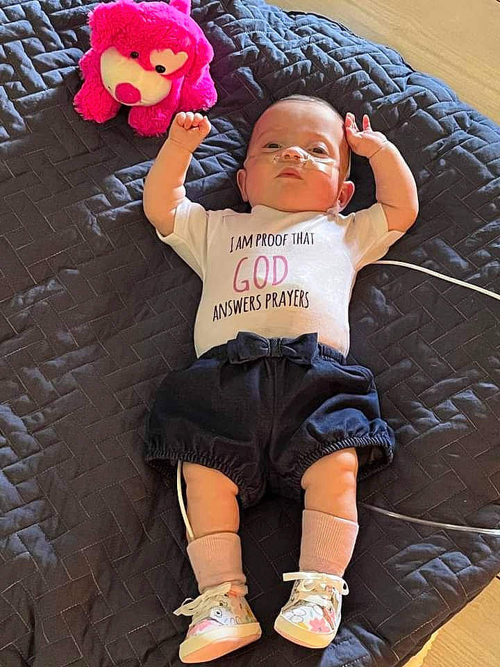 Ashlynn is registered to the contest to win money with this photo: baby_toddler_clothing, cool, flash_photography, fun, happy, head, human, human_leg, knee, outdoor_shoe, person, pink, shorts, sleeve, sneakers, sock, sportswear, t_shirt, thigh, toddler