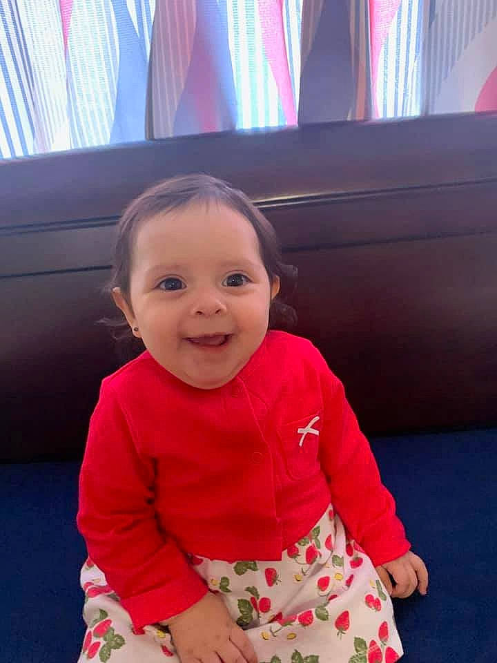 Samantha joined the competition — help win amazing prizes! baby, baby_toddler_clothing, cheek, child, curtain, eye, face, fun, hairstyle, happy, head, joy, magenta, person, pink, skin, sleeve, smile, standing, textile