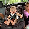 Legend is registered to the contest to win money with this photo: child, car_seat, car_interior, seatbelt, baby, toddler, girl, children, vehicle, safety, casual_clothing, portrait, seat, family, road_trip, window, backseat, tattoo, smile, hair